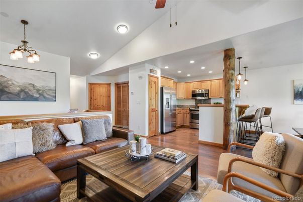 Dining room, Interior, Kitchen, Living room, Pendant Lights, Recessed Lighting, Stainless Steel Appliances, Wood Texture Flooring