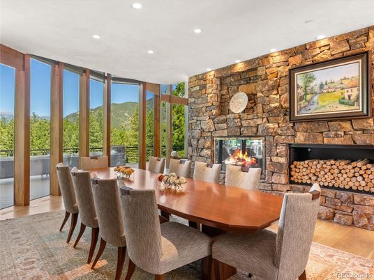 Dining room, Fireplace, Interior, Recessed Lighting, Stone Walls, Wood Texture Flooring