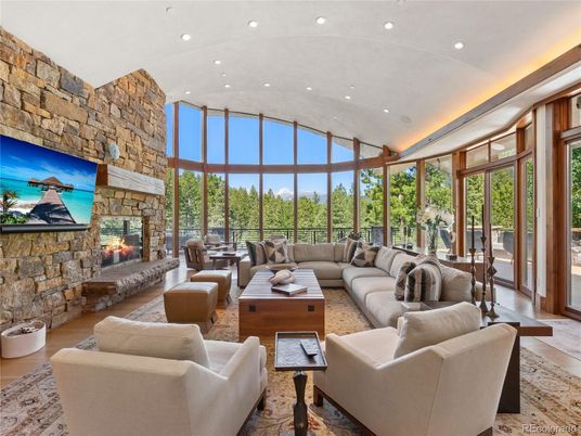 Fireplace, Interior, Living room, Recessed Lighting, Stone Walls, Wood Texture Flooring