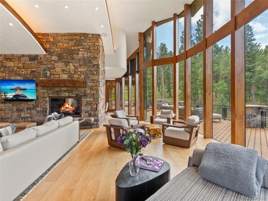 Fireplace, Interior, Living room, Recessed Lighting, Stone Walls, Wood Texture Flooring