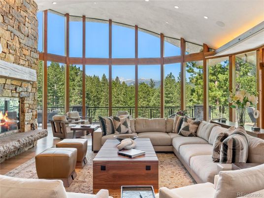 Fireplace, Interior, Living room, Recessed Lighting, Stone Walls, Wood Texture Flooring
