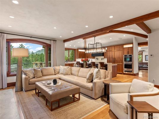Dining room, Interior, Kitchen, Living room, Pendant Lights, Recessed Lighting, Stainless Steel Appliances, Wooden Beams, Wood Texture Flooring