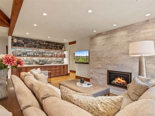 Fireplace, Interior, Living room, Recessed Lighting, Stone Walls, Wooden Beams, Wood Texture Flooring