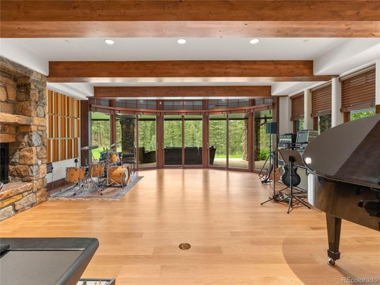 Fireplace, Fitness Equipment, Interior, Recessed Lighting, Stone Walls, Wooden Beams, Wood Texture Flooring