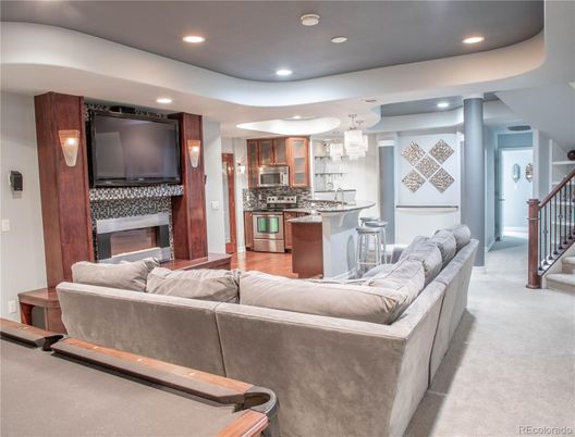 Chandelier, Fireplace, Interior, Kitchen, Living room, Recessed Lighting, Stainless Steel Appliances