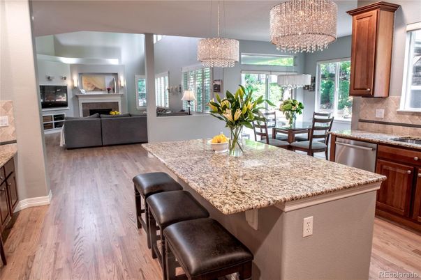 Chandelier, Dining room, Fireplace, Interior, Kitchen, Living room, Wood Texture Flooring