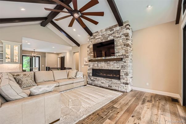 Dining room, Fireplace, Interior, Living room, Pendant Lights, Recessed Lighting, Stone Walls, Wooden Beams, Wood Texture Flooring