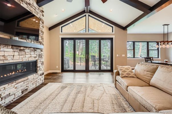 Fireplace, Interior, Living room, Pendant Lights, Recessed Lighting, Stone Walls, Wood Texture Flooring