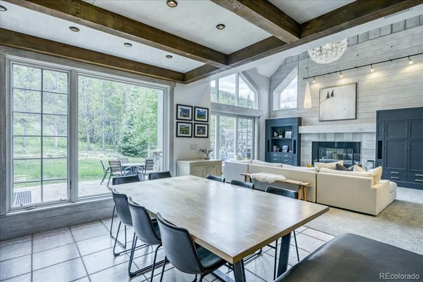 Chandelier, Dining room, Fireplace, Interior, Living room, Recessed Lighting, Wooden Beams