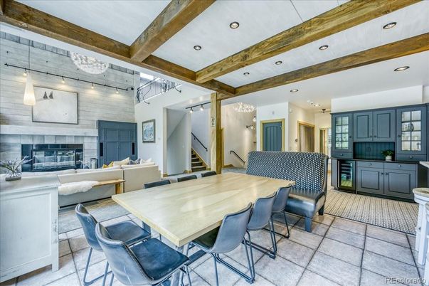 Chandelier, Dining room, Fireplace, Interior, Kitchen, Living room, Pendant Lights, Recessed Lighting, Wooden Beams