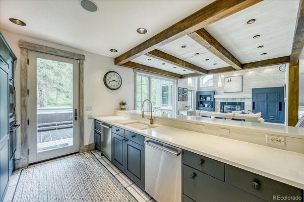 Fireplace, Interior, Kitchen, Recessed Lighting, Stainless Steel Appliances, Wooden Beams