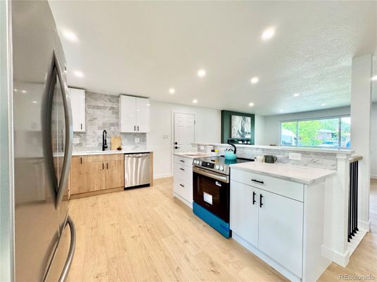 Interior, Kitchen, Recessed Lighting, Stainless Steel Appliances, Wood Texture Flooring