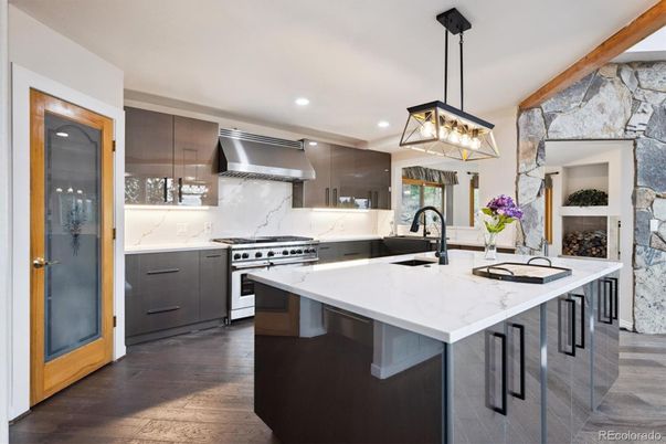 Interior, Kitchen, Pendant Lights, Recessed Lighting, Stainless Steel Appliances, Stone Walls, Wood Texture Flooring