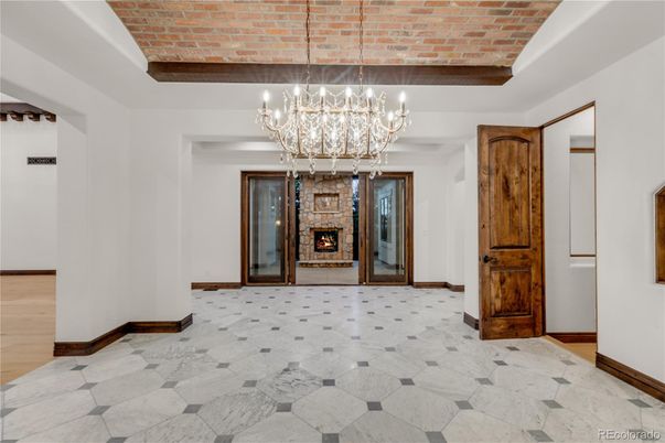 Chandelier, Empty room, Fireplace, Interior, Stone Walls