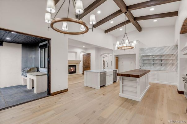 Chandelier, Fireplace, Interior, Kitchen, Pendant Lights, Recessed Lighting, Wooden Beams, Wood Texture Flooring