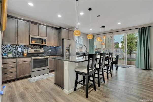 Interior, Kitchen, Pendant Lights, Recessed Lighting, Stainless Steel Appliances, Wood Texture Flooring
