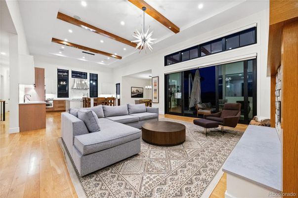 Dining room, Interior, Kitchen, Living room, Pendant Lights, Recessed Lighting, Stainless Steel Appliances, Wooden Beams, Wood Texture Flooring