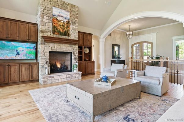 Chandelier, Fireplace, Interior, Living room, Stone Walls, Wood Texture Flooring
