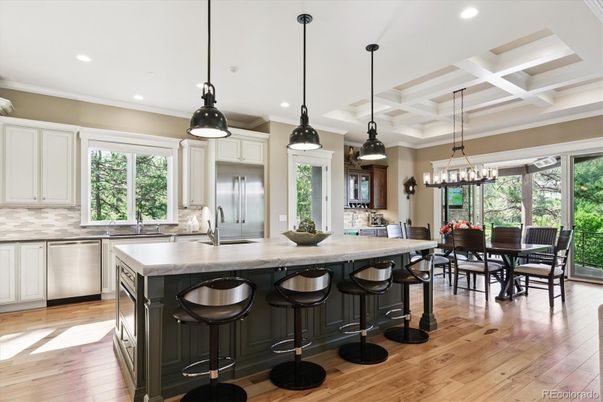 Chandelier, Dining room, Interior, Kitchen, Pendant Lights, Recessed Lighting, Stainless Steel Appliances, Wood Texture Flooring