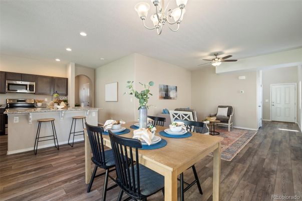 Chandelier, Dining room, Interior, Kitchen, Recessed Lighting, Stainless Steel Appliances, Wood Texture Flooring
