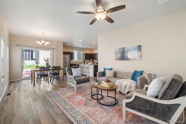 Chandelier, Dining room, Interior, Kitchen, Living room, Recessed Lighting, Stainless Steel Appliances, Wood Texture Flooring