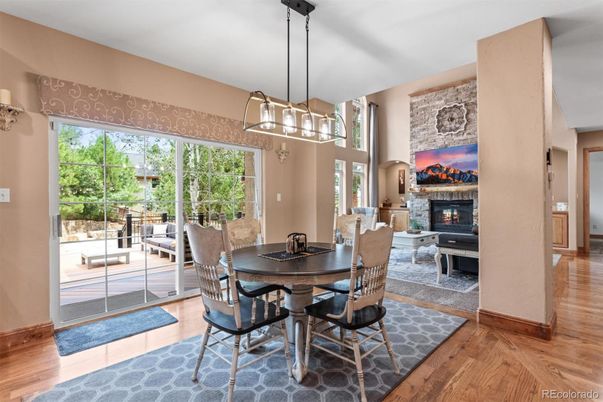 Dining room, Fireplace, Interior, Pendant Lights, Wood Texture Flooring