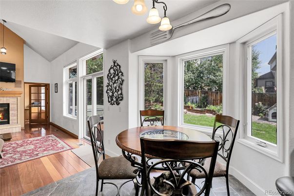 Dining room, Fireplace, Interior, Pendant Lights, Wood Texture Flooring