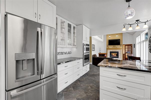 Fireplace, Interior, Kitchen, Pendant Lights, Stainless Steel Appliances