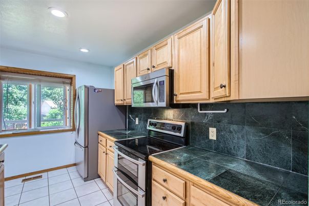 Interior, Kitchen, Recessed Lighting, Tile Countertops