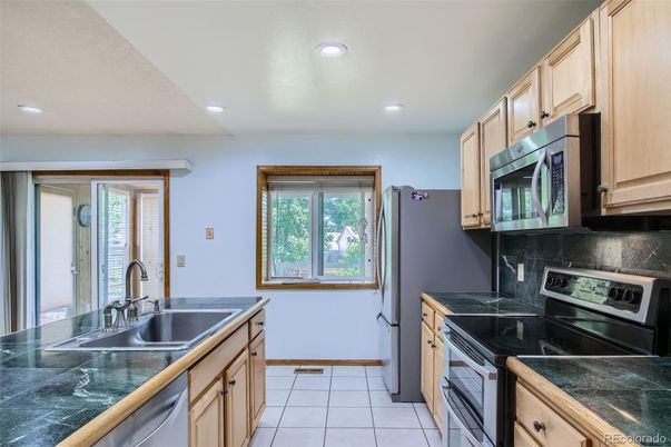 Interior, Kitchen, Recessed Lighting, Tile Countertops