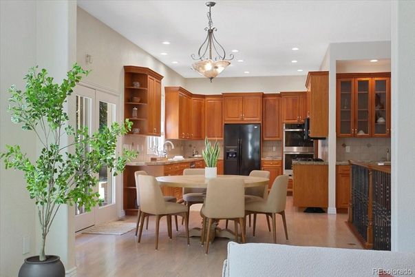 Dining room, Interior, Kitchen, Pendant Lights, Recessed Lighting, Stainless Steel Appliances, Wood Texture Flooring