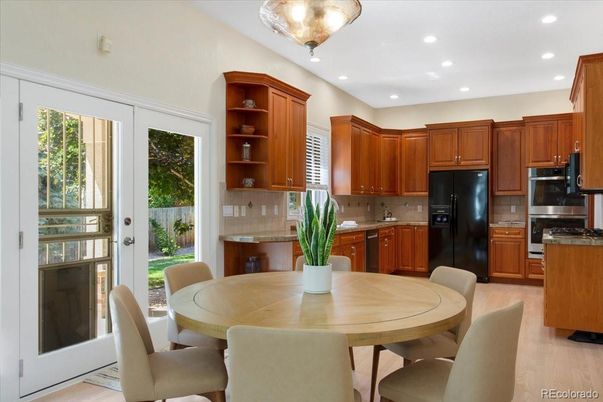 Dining room, Interior, Kitchen, Recessed Lighting, Stainless Steel Appliances, Wood Texture Flooring