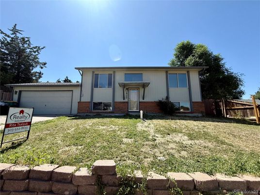 Attached, Backyard, Exterior, Facade, Brick Facade, None