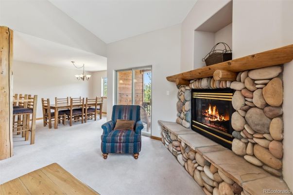 Chandelier, Dining room, Fireplace, Interior, Stone Walls