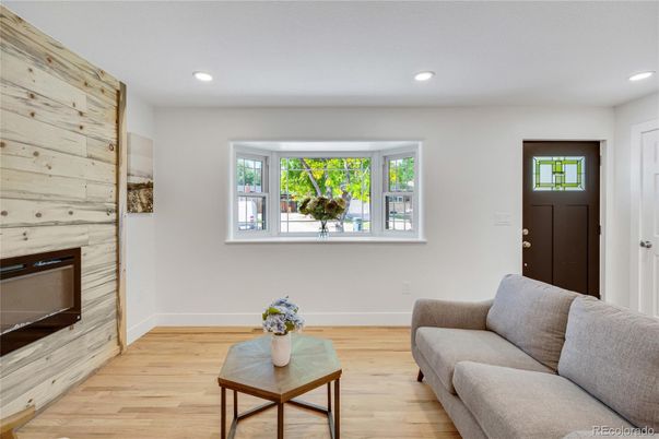 Fireplace, Interior, Living room, Recessed Lighting, Wood Texture Flooring, Wooden Walls