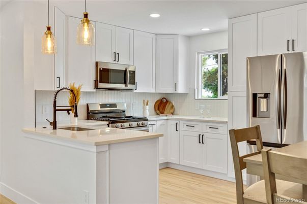 Interior, Kitchen, Pendant Lights, Recessed Lighting, Stainless Steel Appliances, Wood Texture Flooring
