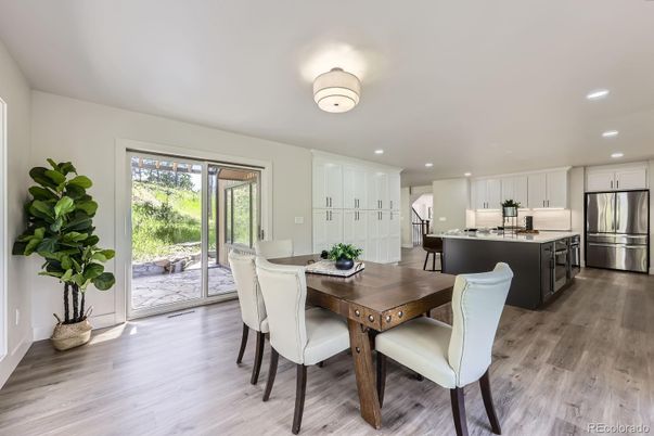 Dining room, Interior, Kitchen, Recessed Lighting, Stainless Steel Appliances, Wood Texture Flooring