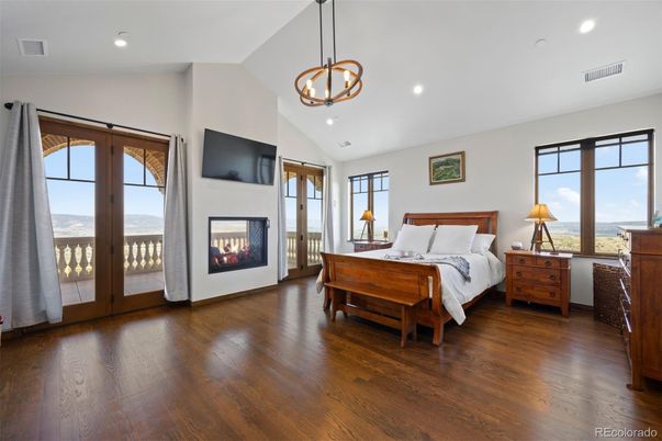 Bedroom, Fireplace, Interior, Pendant Lights, Recessed Lighting, Wood Texture Flooring