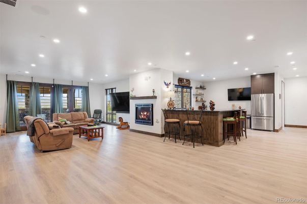 Fireplace, Interior, Kitchen, Living room, Recessed Lighting, Wood Texture Flooring