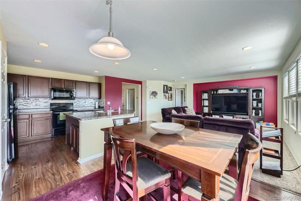 Dining room, Interior, Kitchen, Living room, Pendant Lights, Recessed Lighting, Stainless Steel Appliances, Wood Texture Flooring