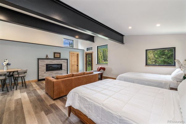 Bedroom, Fireplace, Interior, Recessed Lighting, Wood Texture Flooring