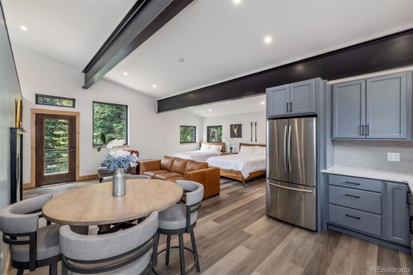 Bedroom, Dining room, Interior, Kitchen, Living room, Recessed Lighting, Stainless Steel Appliances, Wood Texture Flooring