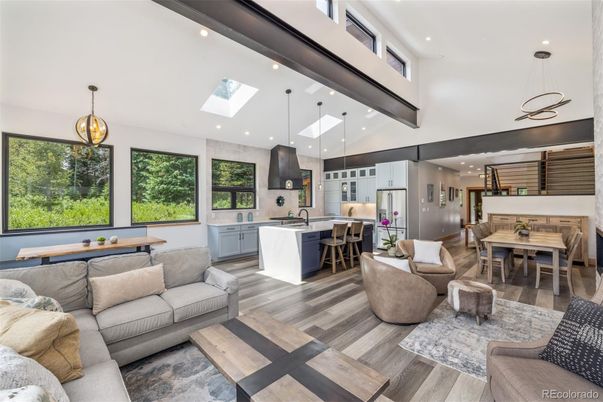 Dining room, Interior, Kitchen, Living room, Pendant Lights, Recessed Lighting, Stainless Steel Appliances, Wood Texture Flooring