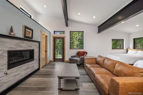 Fireplace, Interior, Living room, Recessed Lighting, Wooden Beams, Wood Texture Flooring
