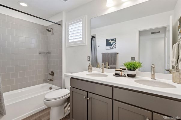 Bathroom, Dual Sink Vanities, Interior, Recessed Lighting, Wood Texture Flooring