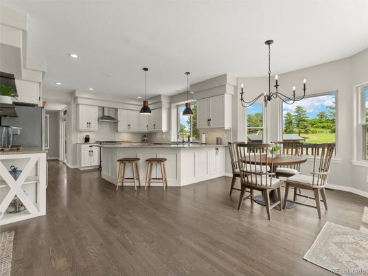 Dining room, Interior, Kitchen, Pendant Lights, Recessed Lighting, Stainless Steel Appliances, Wood Texture Flooring
