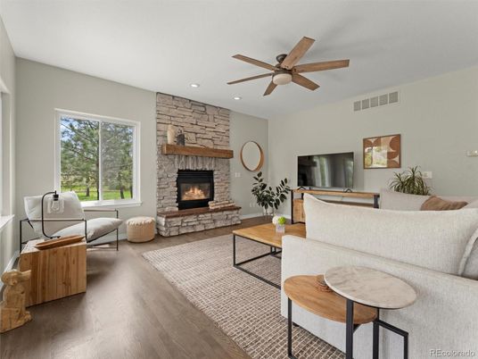 Fireplace, Interior, Living room, Recessed Lighting, Stone Walls, Wood Texture Flooring