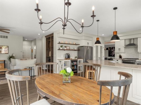 Dining room, Interior, Kitchen, Pendant Lights, Recessed Lighting, Stainless Steel Appliances, Wood Texture Flooring