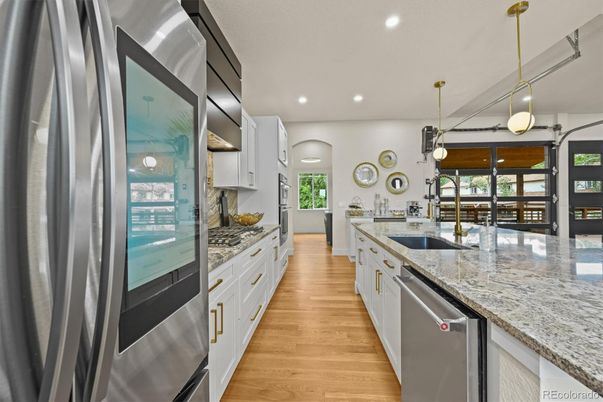 Interior, Kitchen, Pendant Lights, Recessed Lighting, Stainless Steel Appliances, Wood Texture Flooring