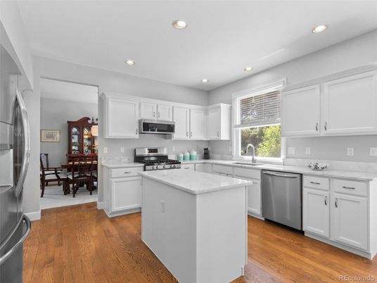 Dining room, Interior, Kitchen, Recessed Lighting, Stainless Steel Appliances, Wood Texture Flooring